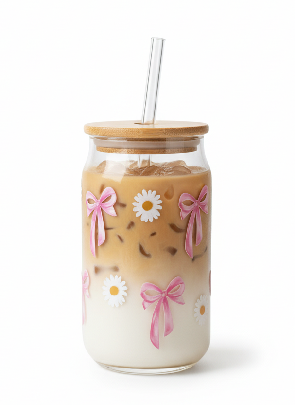 Jar with floral design and straw on a white background
