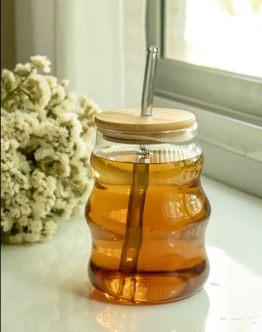 Fluted glass tumbler with straw