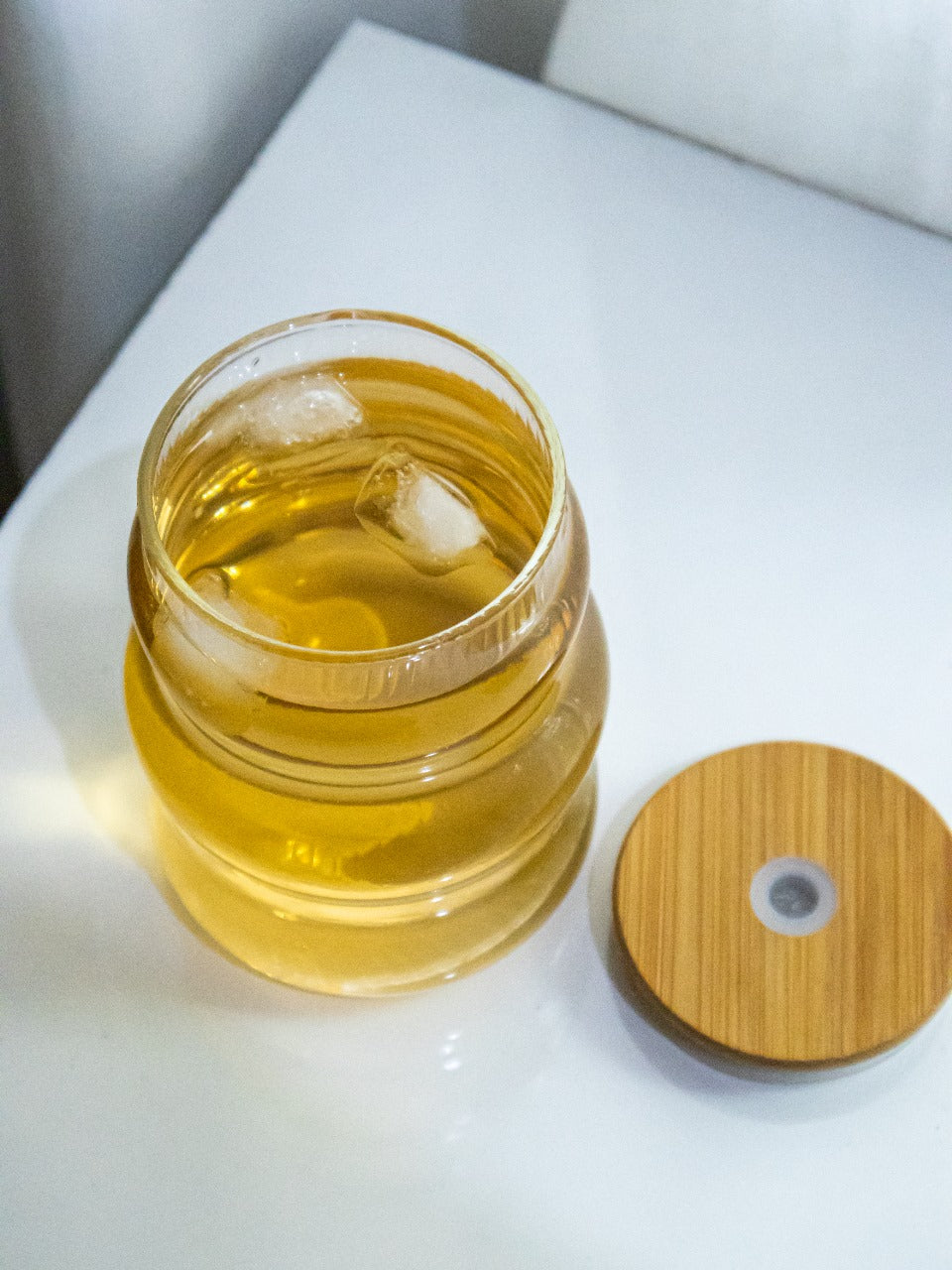 Fluted glass tumbler with straw